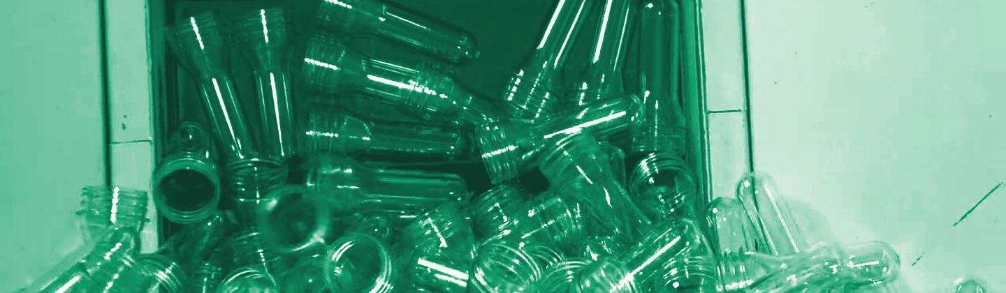 Cascade of clear PET preforms, green duotone