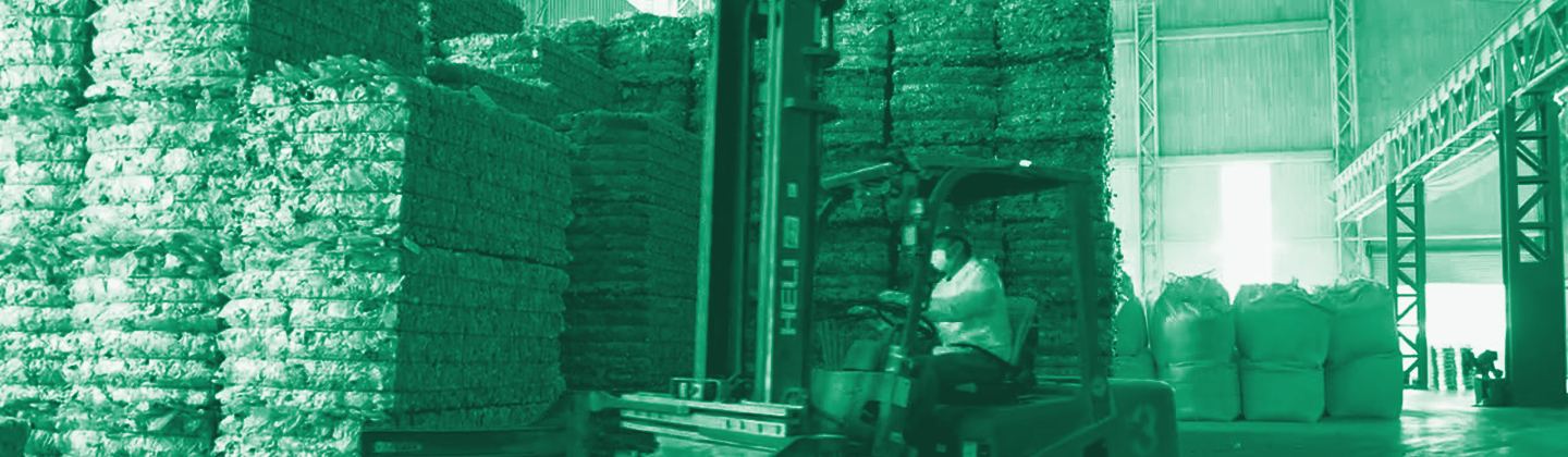 Baled post-consumer PET bottles, green duotone