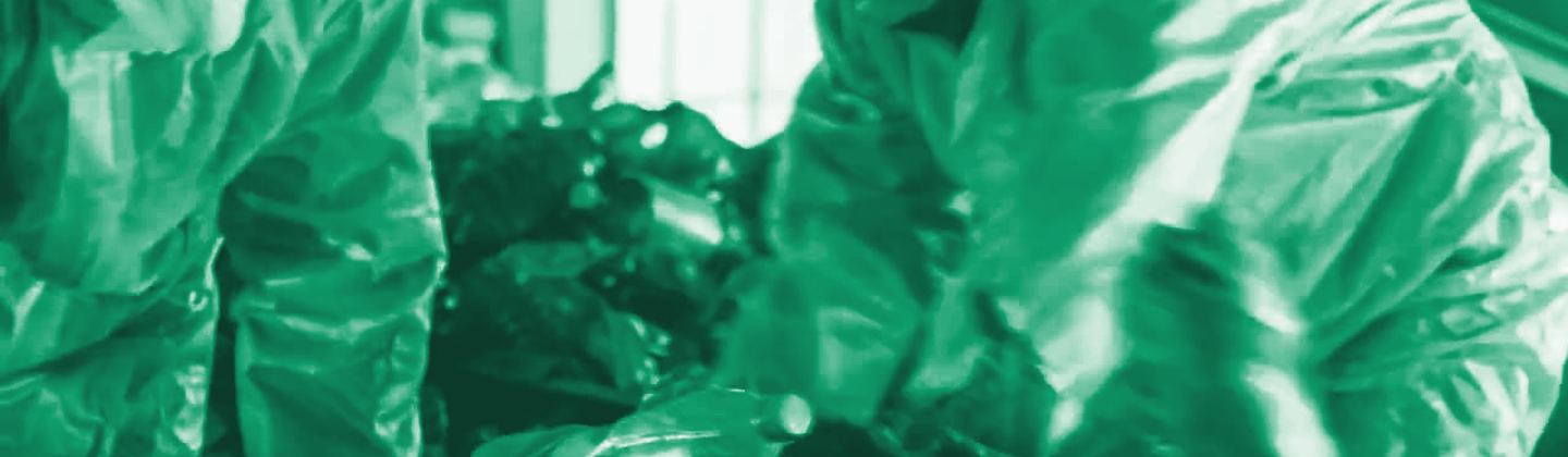 Operators working a recycling stream, green duotone