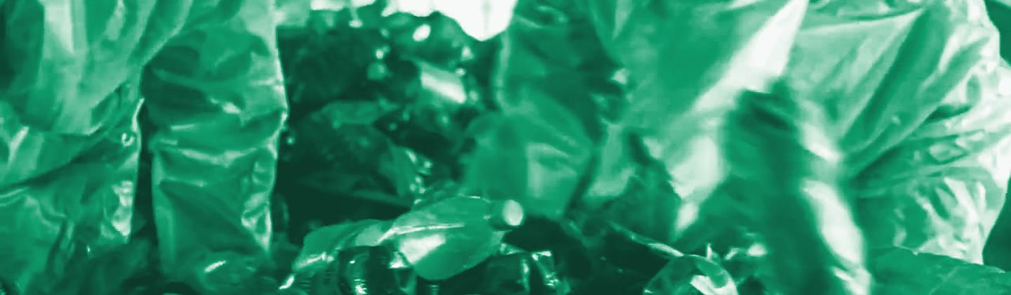 Workers sorting mixed post-consumer bottles, green duotone